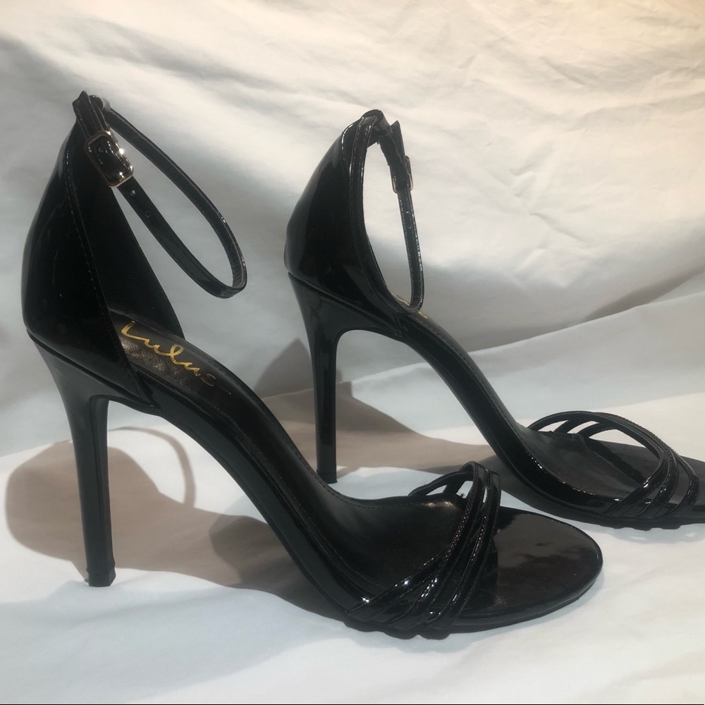 Black shiny Lulu’s high heels